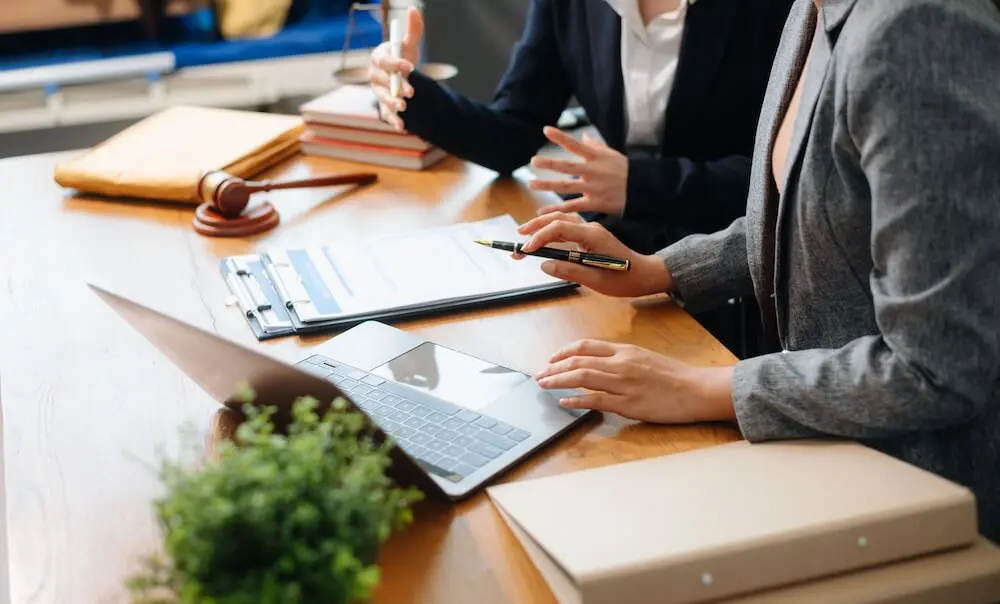 lawyer and client preparing to sue someone for a personal injury claim