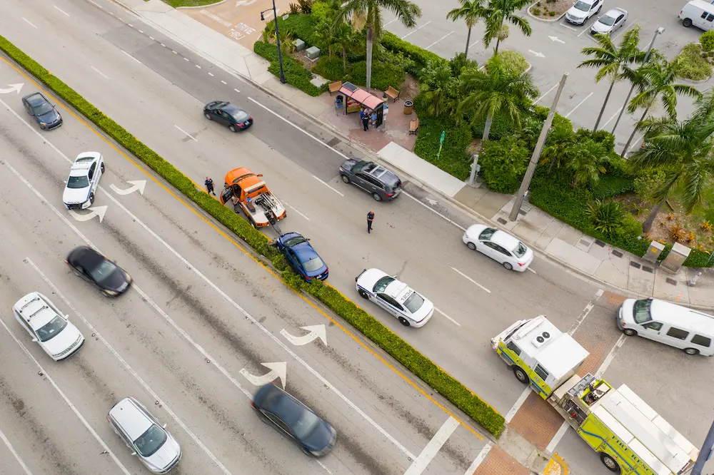 Aerial photo of a car accident with police directing traffic in florida