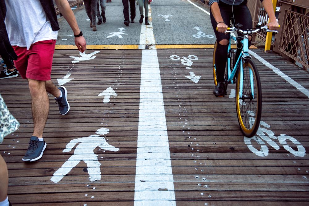 A travel lane split for pedestrians and cyclists.