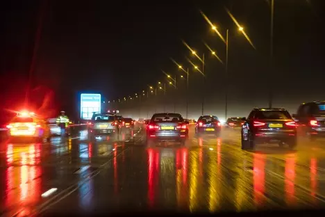 Cars on a wet freeway