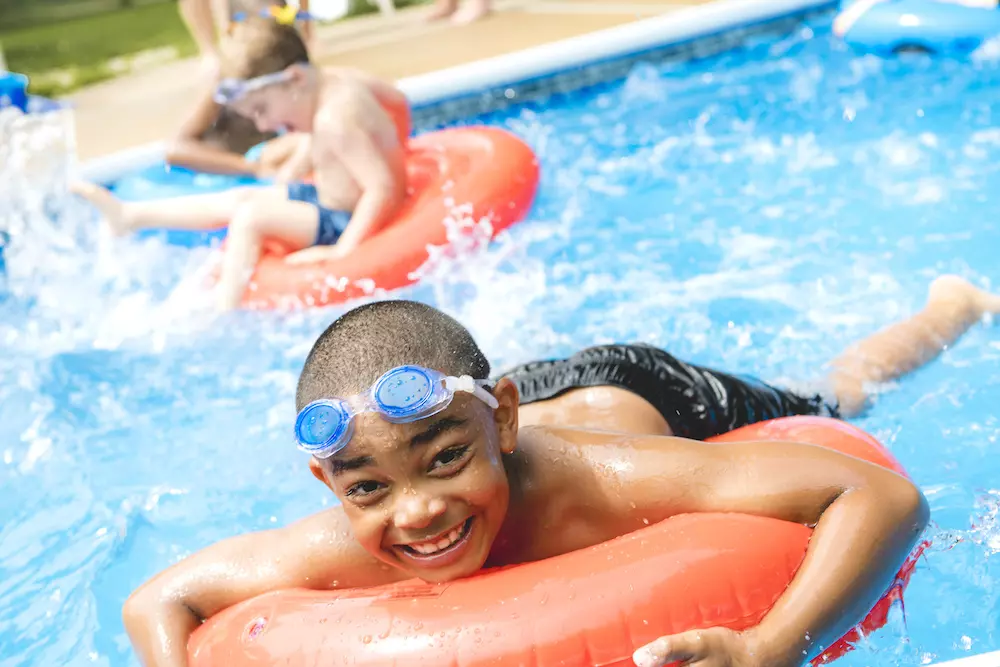 children practicing pool safety in the summer in florida
